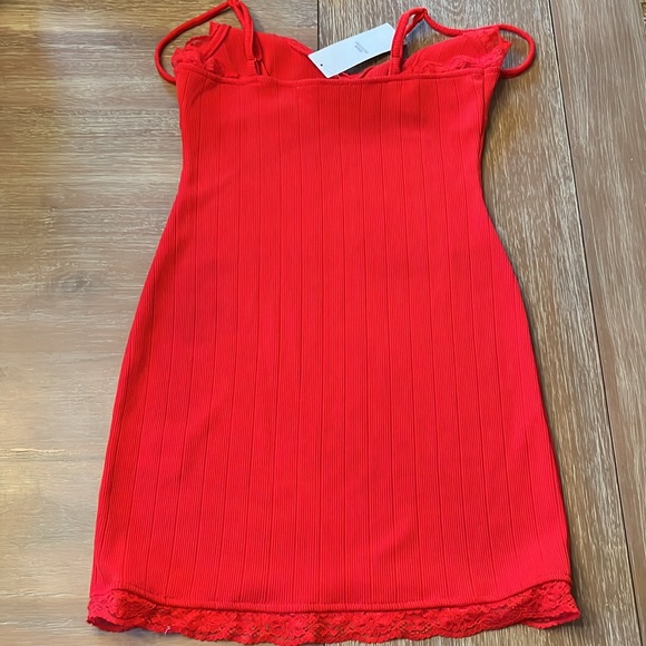 Urban Outfitters red mini dress small. Stretchy, lace. New with Tags, small flaw - Picture 7 of 8